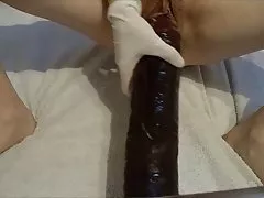 Consolador grande en coño